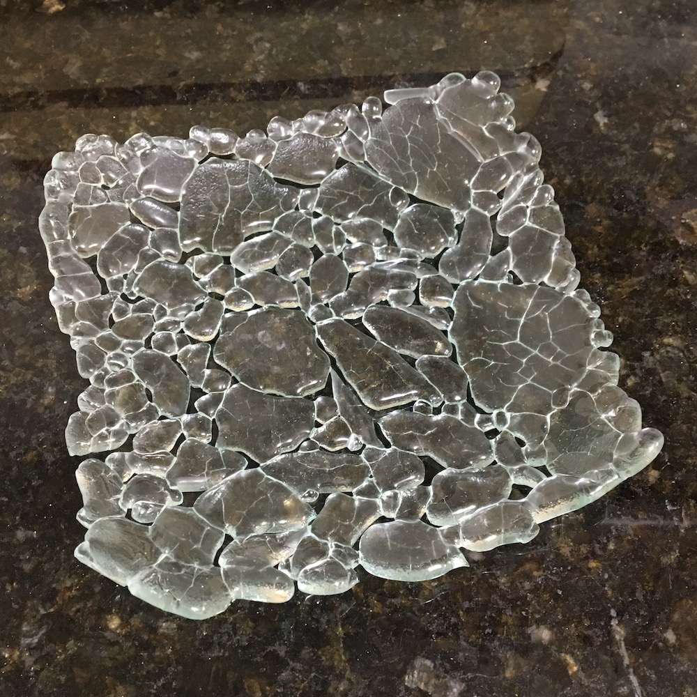 Clear glass dish resembling crushed ice
